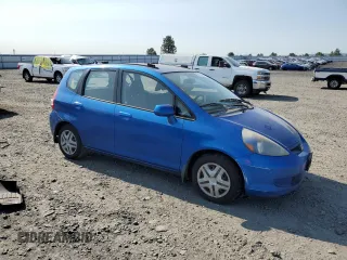 2007 Honda Fit with VIN JHMGD37407S044719, listed as a Copart auction lot 59192715 with 275,955 mi miles and Clean title. Bid and sale history available at DreamBid. Image 4.