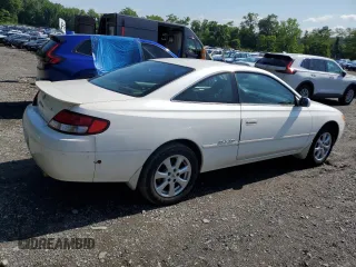 2000 Toyota Solara SE z VIN 2T1CF28P2YC378976, wystawiony jako Copart lot #61400195 z przebiegiem 197 090 mil mil oraz Czysty tytuł • Clean title. Historia ofert i sprzedaży dostępna na DreamBid. Obrazek 3.