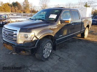2014 Ford F-150 XL with VIN 1FTFW1ETXEFA34517, listed as a IAAI auction lot 41325436 with 163,639 mi miles. Bid and sale history available at carsss.com. Image 2.