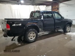 2004 Dodge Dakota Sport z VIN 1D7HG38KX4S782636, wystawiony jako Copart lot #88805195 z przebiegiem 151 620 mil mil oraz Szkoda całkowita • Salvage title. Historia ofert i sprzedaży dostępna na DreamBid. Obrazek 3.
