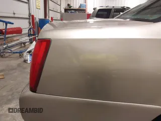 2004 Cadillac DeVille z VIN 1G6KD54Y04U119341, wystawiony jako IAAI lot #42193664 z przebiegiem 162 290 mil mil oraz . Historia ofert i sprzedaży dostępna na DreamBid. Obrazek 21.