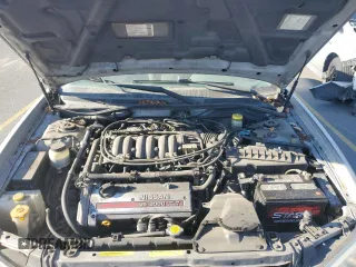 2001 Nissan Maxima SE 20th Anniversary. z VIN JN1CA31A91T314977, wystawiony jako Copart lot #75260034 z przebiegiem 178 471 mil mil oraz Szkoda całkowita • Salvage title. Historia ofert i sprzedaży dostępna na DreamBid. Obrazek 11.