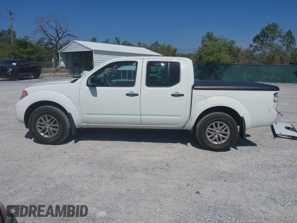 2015 Nissan Frontier SV with VIN 1N6AD0ER0FN746599, listed as a IAAI auction lot 41944073 with 63,347 mi miles and . Bid and sale history available at DreamBid. Image 15.