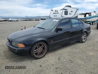 2000 BMW 5 Series with VIN WBADM5341YBY17346, listed as a Copart auction lot 52618955 with 268,792 mi miles and Salvage title. Bid and sale history available at DreamBid. Image 1.