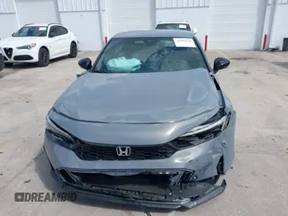 2025 Honda Civic Sport with VIN 2HGFE2F57SH571849, listed as a IAAI auction lot 41902538 with 869 mi miles and . Bid and sale history available at DreamBid. Image 12.