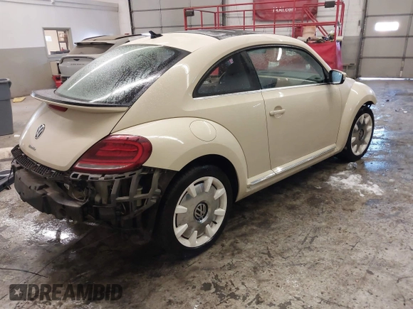 2019 Volkswagen Beetle S with VIN 3VWFD7ATXKM705322, listed as a IAAI auction lot 41409600 with 97,479 mi miles. Bid and sale history available at carsss.com. Image 4.