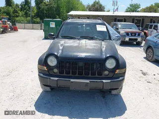 2006 Jeep Liberty Sport with VIN 1J4GK48K46W246801, listed as a IAAI auction lot 42048509 with 219,077 mi miles. Bid and sale history available at carsss.com. Image 6.