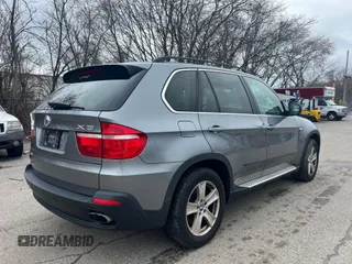 2007 BMW X5 4.8i z VIN 5UXFE83527LZ44584, wystawiony jako IAAI lot #42364598 z przebiegiem 154 837 mil mil oraz . Historia ofert i sprzedaży dostępna na DreamBid. Obrazek 4.