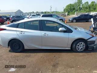 2022 Toyota Prius L Eco z VIN JTDKAMFU2N3165805, wystawiony jako IAAI lot #42428676 z przebiegiem 435 471 mil mil oraz . Historia ofert i sprzedaży dostępna na DreamBid. Obrazek 13.