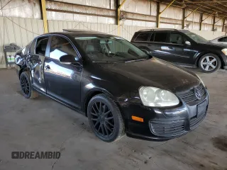 2009 Volkswagen Jetta Wolfsburg Edition with VIN 3VWRJ71K69M009385, listed as a Copart auction lot 47204505 with 176,649 mi miles and Salvage title. Bid and sale history available at DreamBid. Image 4.