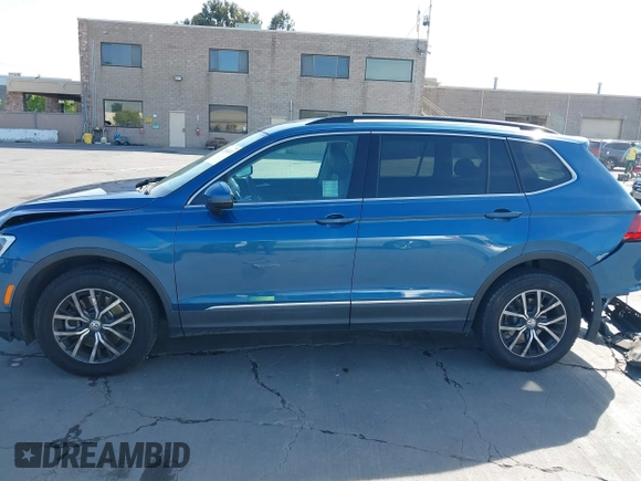 2018 Volkswagen Tiguan SEL with VIN 3VV2B7AX9JM204108, listed as a IAAI auction lot 42504747 with 87,379 mi miles and . Bid and sale history available at DreamBid. Image 14.