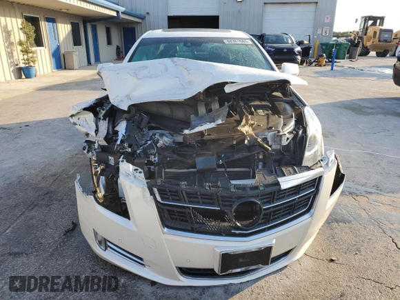 2014 Cadillac XTS Platinum z VIN 2G61W5S84E9153242, wystawiony jako Copart lot #88361685 z przebiegiem 141 401 mil mil oraz Szkoda całkowita • Salvage title. Historia ofert i sprzedaży dostępna na DreamBid. Obrazek 5.