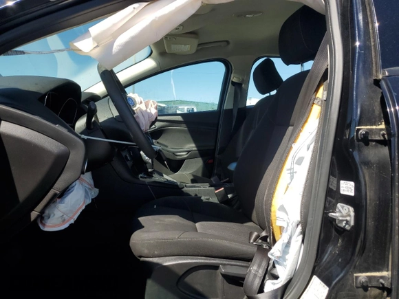 2017 Ford Focus SE with VIN 1FADP3F24HL248615, listed as a Copart auction lot 50526875 with 96,008 mi miles and Salvage Title. Bid and sale history available at DreamBid. Image 7.
