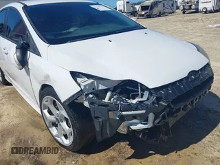 2014 Ford Focus ST with VIN 1FADP3L99EL311771, listed as a IAAI auction lot 41419521 with 124,572 mi miles and . Bid and sale history available at carsss.com. Image 6.