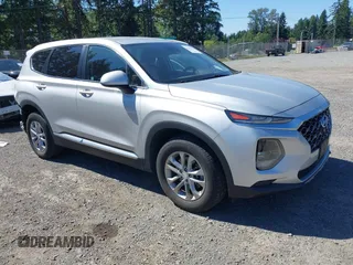 2019 Hyundai Santa Fe SE with VIN 5NMS2CAD9KH122140, listed as a IAAI auction lot 42616171 with 50,794 mi miles and . Bid and sale history available at DreamBid. Image 1.