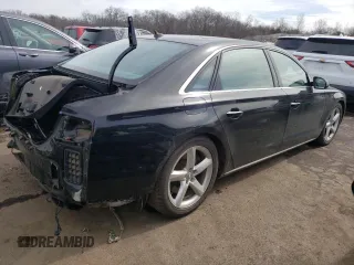 2015 Audi A8 L 4.0T with VIN WAU32AFD7FN033464, listed as a Copart auction lot 42682643 with 130,105 mi miles. Bid and sale history available at carsss.com. Image 3.