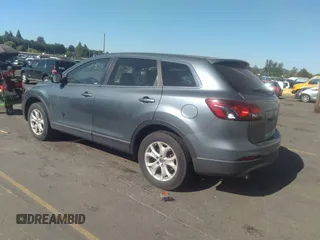 2013 Mazda CX-9 Touring z VIN JM3TB3CV9D0410518, wystawiony jako IAAI lot #37226058 z przebiegiem 89 568 mil mil oraz . Historia ofert i sprzedaży dostępna na DreamBid. Obrazek 3.