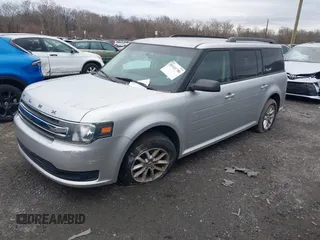 2016 Ford Flex SE with VIN 2FMGK5B80GBA12646, listed as a IAAI auction lot 41141786 with 100,000 mi miles. Bid and sale history available at carsss.com. Image 2.