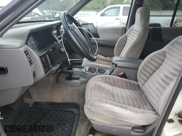 1995 Jeep Grand Cherokee Laredo z VIN 1J4GZ58S2SC578183, wystawiony jako Copart lot #61665955 z przebiegiem 341 135 mil mil oraz Szkoda całkowita • Salvage title. Historia ofert i sprzedaży dostępna na DreamBid. Obrazek 7.