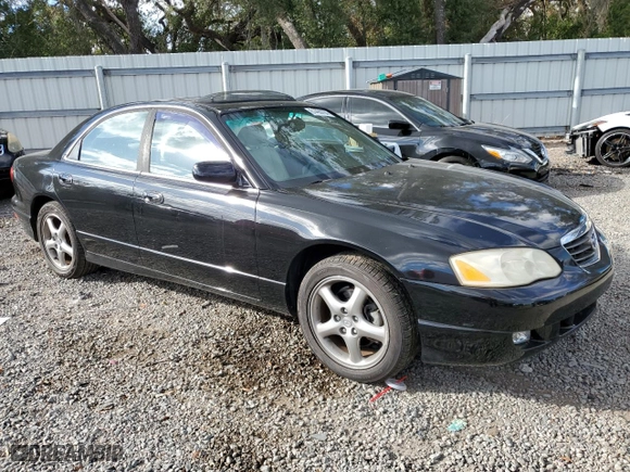 2002 Mazda Millenia with VIN JM1TA221421729790, listed as a Copart auction lot 84460794 with NaN miles and Salvage Title. Bid and sale history available at carsss.com. Image 4.