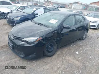2019 Toyota Corolla L with VIN 2T1BURHE9KC236995, listed as a IAAI auction lot 41900101 with 162,810 mi miles. Bid and sale history available at carsss.com. Image 17.
