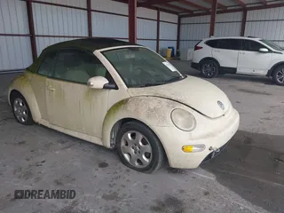 2003 Volkswagen Beetle GLS z VIN 3VWCK21Y33M309841, wystawiony jako IAAI lot #41883298 z przebiegiem 169 430 mil mil oraz . Historia ofert i sprzedaży dostępna na DreamBid. Obrazek 1.