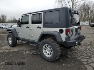 2007 Jeep Wrangler Unlimited X with VIN 1J4GA39177L105582, listed as a Copart auction lot 88912935 with 156,156 mi miles and Salvage Title. Bid and sale history available at DreamBid. Image 2.