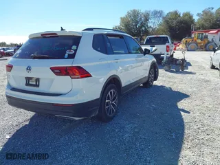 2021 Volkswagen Tiguan S with VIN 3VV1B7AX9MM056025, listed as a IAAI auction lot 41352521 with 98,944 mi miles. Bid and sale history available at carsss.com. Image 4.