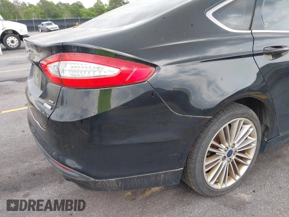 2014 Ford Fusion SE with VIN 3FA6P0HD5ER182028, listed as a IAAI auction lot 42108063 with 198,131 mi miles and . Bid and sale history available at DreamBid. Image 6.