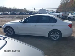 2018 BMW 3 Series 320i xDrive with VIN WBA8E5G53JNV03347, listed as a IAAI auction lot 41908985 with 122,111 mi miles. Bid and sale history available at carsss.com. Image 14.