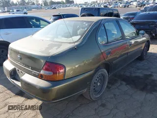 1998 Nissan Altima XE with VIN 1N4DL01D9WC178142, listed as a IAAI auction lot 42207069 with 204,834 mi miles and . Bid and sale history available at carsss.com. Image 4.