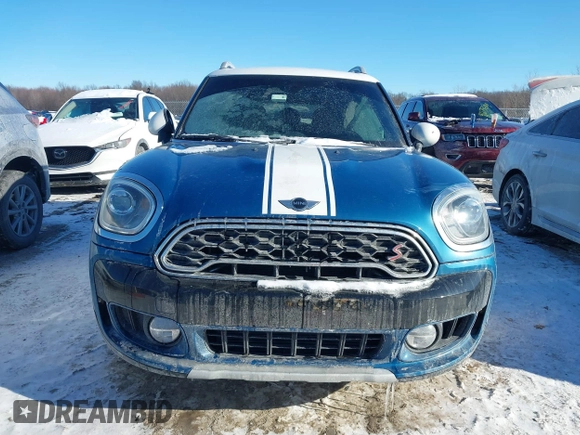 2018 MINI Countryman Cooper S with VIN WMZYT5C3XJ3E61612, listed as a IAAI auction lot 41276107 with 59,554 mi miles and . Bid and sale history available at DreamBid. Image 13.