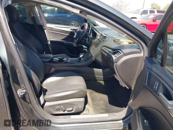 2016 Ford Fusion Titanium with VIN 3FA6P0K98GR158877, listed as a IAAI auction lot 41994013 with 57,027 mi miles and . Bid and sale history available at DreamBid. Image 5.