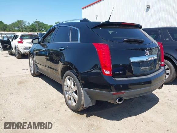 2011 Cadillac SRX Premium Collection z VIN 3GYFNCEY5BS597566, wystawiony jako IAAI lot #41983784 z przebiegiem 102 989 mil mil oraz . Historia ofert i sprzedaży dostępna na DreamBid. Obrazek 3.