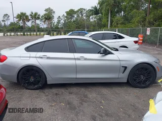 2015 BMW 4 Series 435i with VIN WBA4B1C58FG241018, listed as a IAAI auction lot 41401671 with 79,369 mi miles. Bid and sale history available at carsss.com. Image 13.
