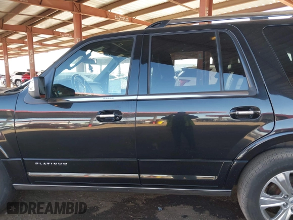 2015 Ford Expedition Platinum with VIN 1FMJU1LT5FEF38026, listed as a IAAI auction lot 41189584 with 129,948 mi miles and . Bid and sale history available at DreamBid. Image 14.