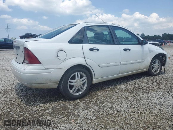 2003 Ford Focus SE with VIN 1FAFP34353W231334, listed as a Copart auction lot 63844205 with 86,601 mi miles and Salvage title. Bid and sale history available at DreamBid. Image 3.