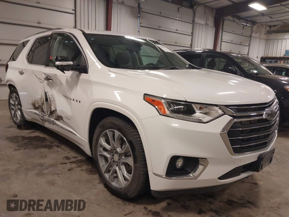 2021 Chevrolet Traverse Premier with VIN 1GNEVKKW8MJ259346, listed as a IAAI auction lot 41810312 with 80,474 mi miles. Bid and sale history available at carsss.com. Image 1.