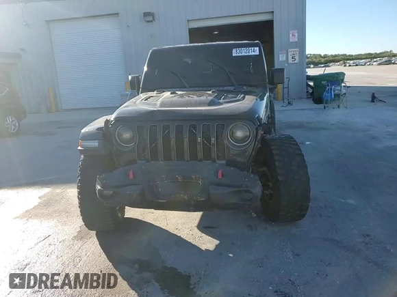 2020 Jeep Gladiator Rubicon z VIN 1C6JJTBG5LL101185, wystawiony jako Copart lot #83012014 z przebiegiem Nie podano mil oraz Nie do naprawy • Non repairable. Historia ofert i sprzedaży dostępna na DreamBid. Obrazek 11.