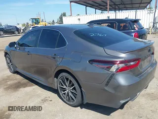 2023 Toyota Camry SE with VIN 4T1G11AK2PU079820, listed as a IAAI auction lot 42003967 with 39,077 mi miles. Bid and sale history available at carsss.com. Image 3.