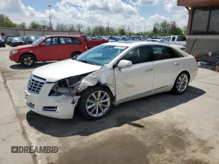 2014 Cadillac XTS Luxury z VIN 2G61M5S33E9193905, wystawiony jako Copart lot #55479605 z przebiegiem 143 006 mil mil oraz Szkoda całkowita • Salvage title. Historia ofert i sprzedaży dostępna na DreamBid. Obrazek 1.