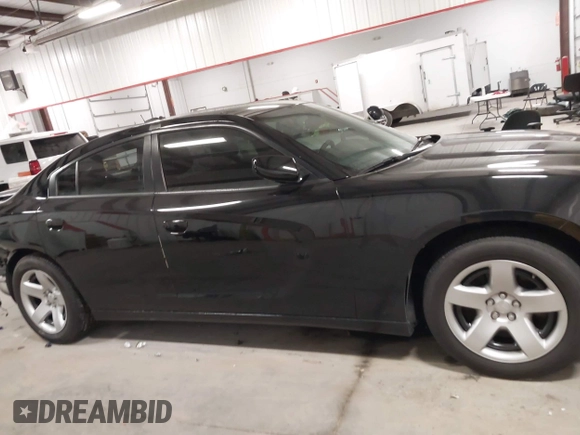 2022 Dodge Charger Police with VIN 2C3CDXAT6NH110044, listed as a IAAI auction lot 41292387 with 59,324 mi miles and . Bid and sale history available at DreamBid. Image 14.