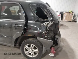 2008 Kia Sportage LX with VIN KNDJE723387535641, listed as a IAAI auction lot 41348580 with 184,430 mi miles. Bid and sale history available at carsss.com. Image 6.