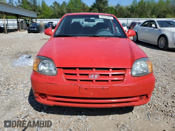 2005 Hyundai Accent GLS with VIN KMHCG45C15U592443, listed as a Copart auction lot 52291025 with 142,263 mi miles and Salvage Title. Bid and sale history available at carsss.com. Image 5.
