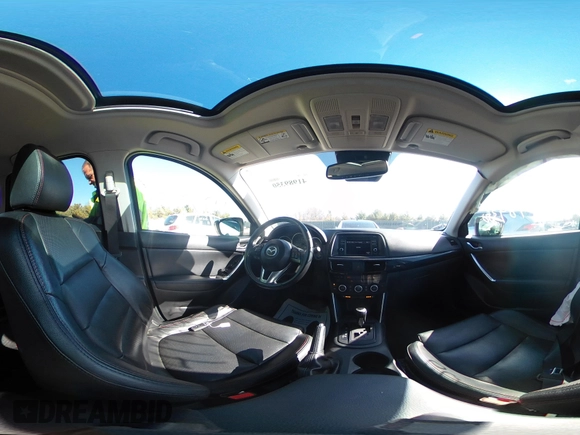 2014 Mazda CX-5 Grand Touring with VIN JM3KE4DY4E0320695, listed as a IAAI auction lot 41989350 with 169,391 mi miles and . Bid and sale history available at DreamBid. Image 19.