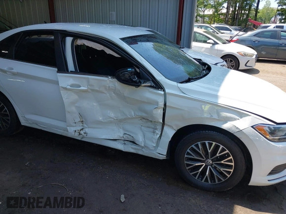 2021 Volkswagen Jetta S with VIN 3VWC57BU0MM086014, listed as a IAAI auction lot 42386251 with 82,397 mi miles and . Bid and sale history available at DreamBid. Image 6.