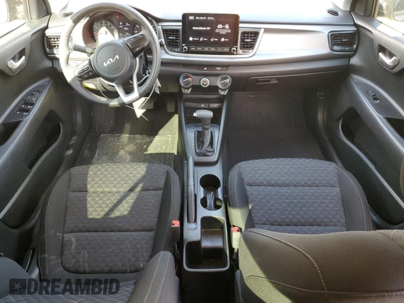 2022 Kia Rio S with VIN 3KPA24AD5NE463208, listed as a Copart auction lot 68380014 with 37,572 mi miles and Salvage Title. Bid and sale history available at DreamBid. Image 8.