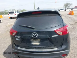 2016 Mazda CX-5 Sport with VIN JM3KE4BY8G0746377, listed as a IAAI auction lot 41990988 with 144,558 mi miles and . Bid and sale history available at carsss.com. Image 16.