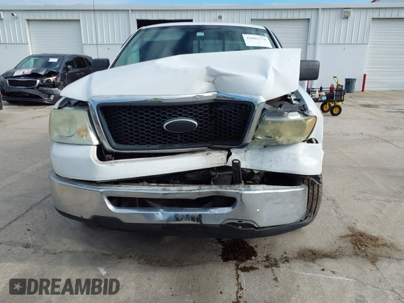 2006 Ford F-150 XL with VIN 1FTPX12VX6NB83220, listed as a IAAI auction lot 42001770 with 228,216 mi miles. Bid and sale history available at carsss.com. Image 13.