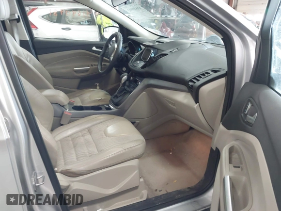 2016 Ford Escape SE with VIN 1FMCU0GX6GUB91605, listed as a IAAI auction lot 41640981 with 130,517 mi miles. Bid and sale history available at carsss.com. Image 5.